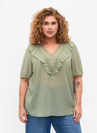 Blouse with short sleeves and dotted structure, Seagrass , Model