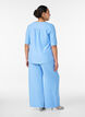 Loose trousers with elasticated waistband and pockets, Light Blue, Model image number 1