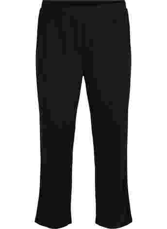 Loose trousers with structure