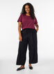 Corduroy trousers with wide legs and a high waist, Black, Model image number 0