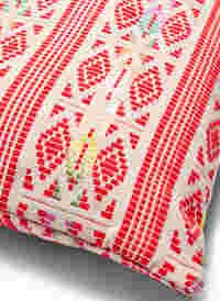Cushion cover with embroidered pattern