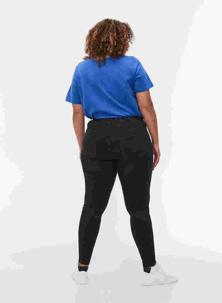Super slim Amy jeans with piping, Black, Model image number 1