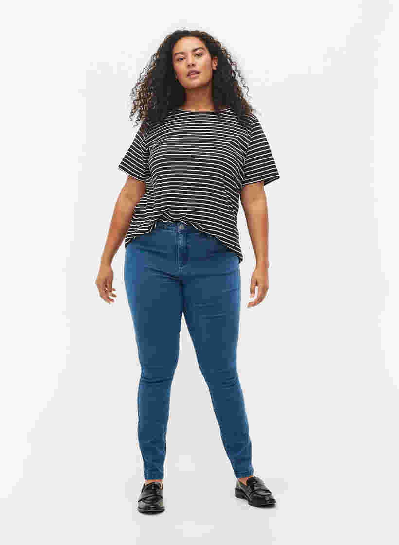 High-waisted super slim Amy jeans , Mid Blue, Model