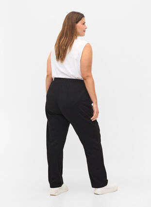 Loose trousers with elasticated waist, Black, Model image number 1