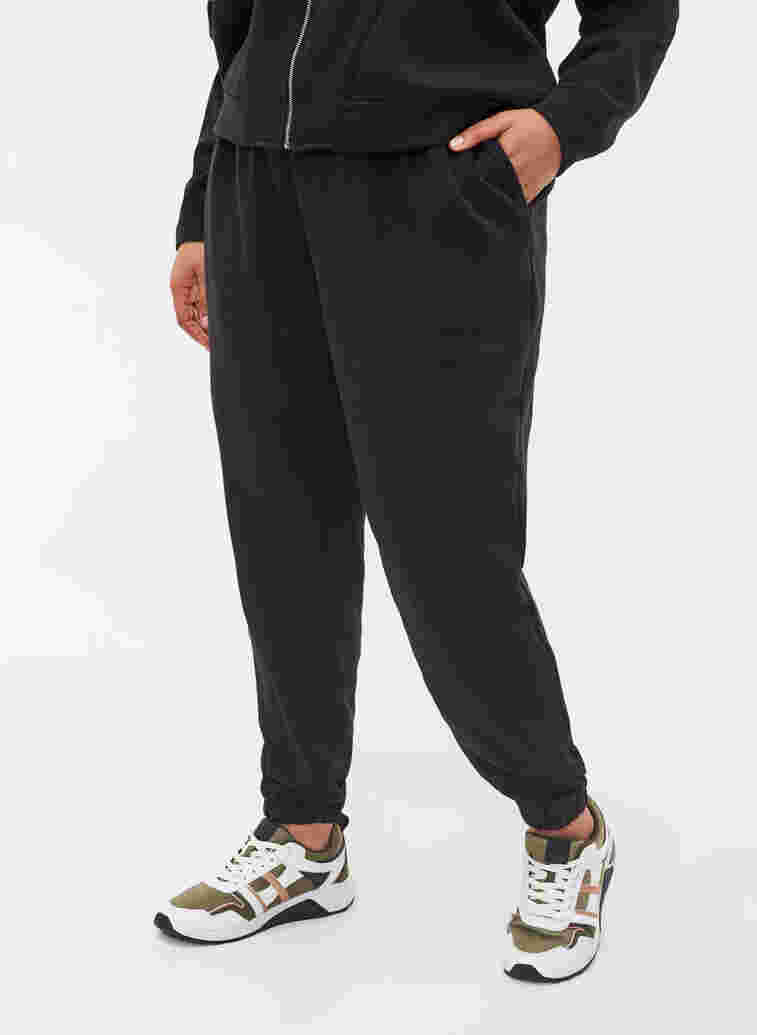 Loose cotton trousers with pockets, Black, Model image number 2