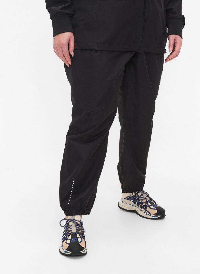 Rain trousers with reflectors, Black, Model image number 4