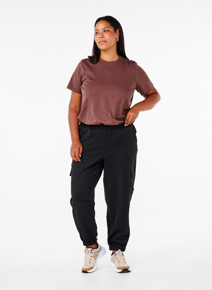 Trousers with cargo pockets and elasticated waist, Black, Model image number 0