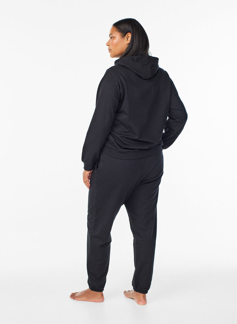 Sweatpants with pockets, Black, Model image number 1