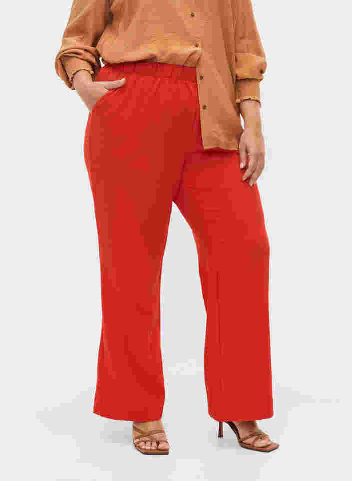 Flared trousers with pockets, Fiery Red, Model image number 3