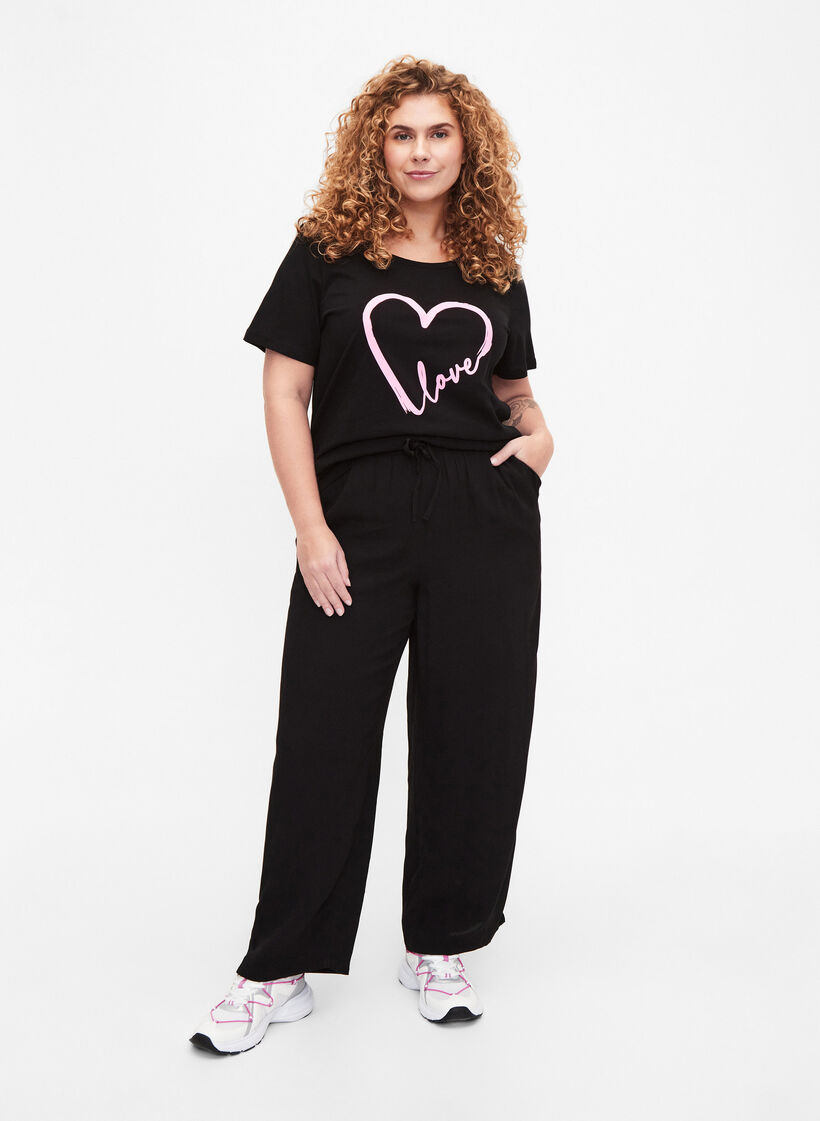 Loose viscose trousers with print, Black, Model image number 0