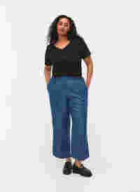 Loose denim trousers in lyocell (TENCEL™), Dark Blue, Model