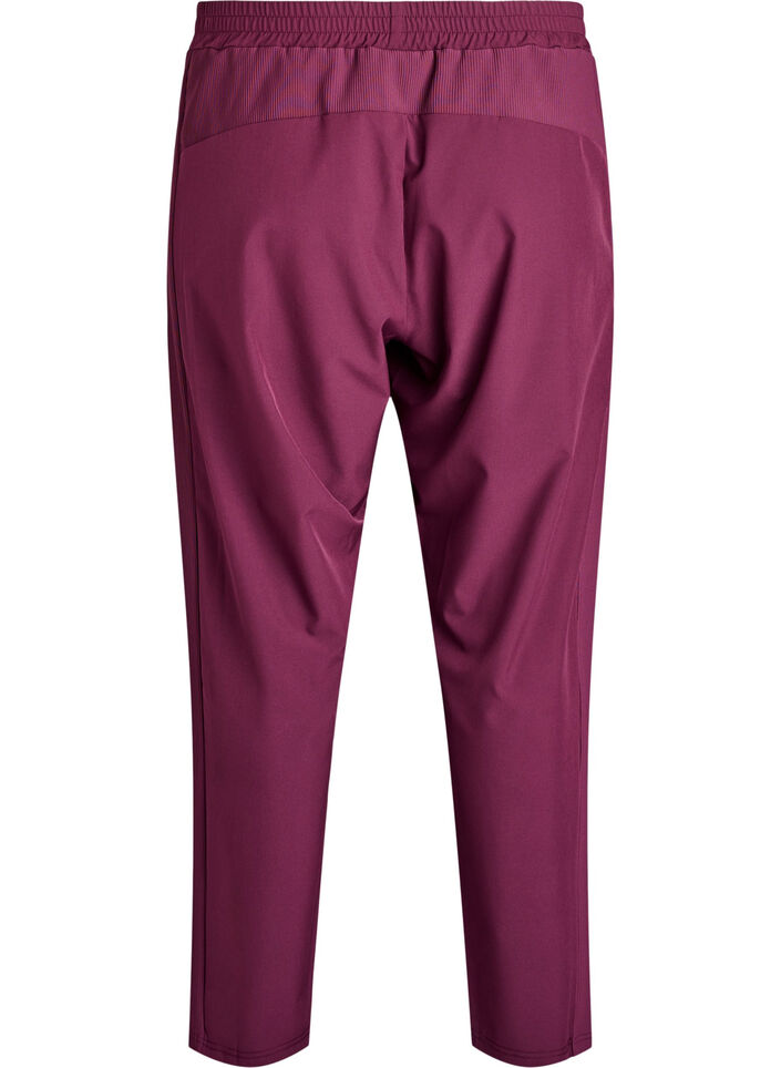 Lightweight training trousers with pockets, Red, Packshot image number 1