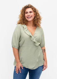 Wrap blouse in viscose with 1/2 sleeves, Seagrass , Model