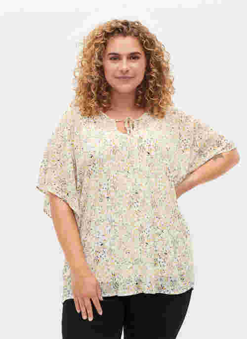 Printed blouse with tie strings and short sleeves