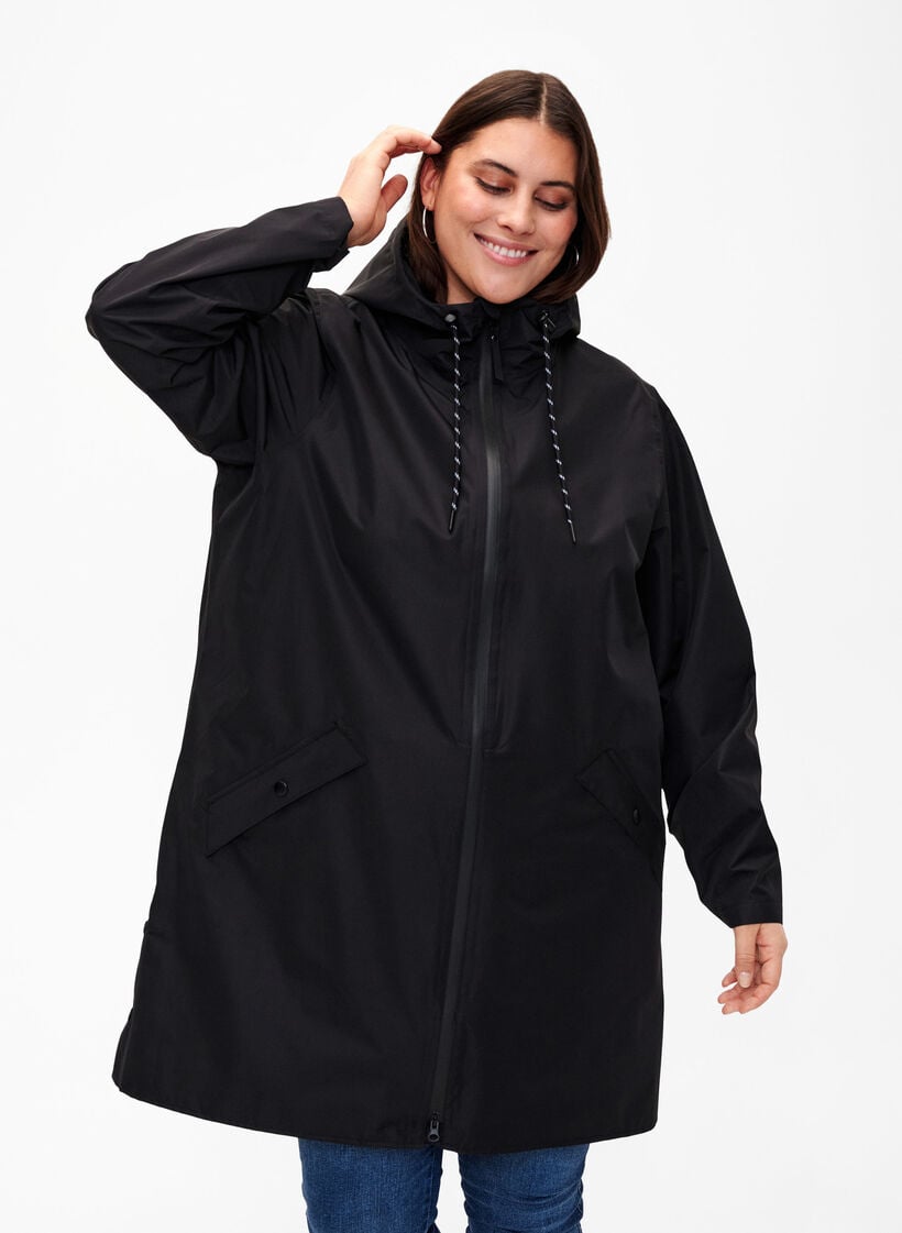 Rain jacket with pockets and a hood, Black, Model image number 0