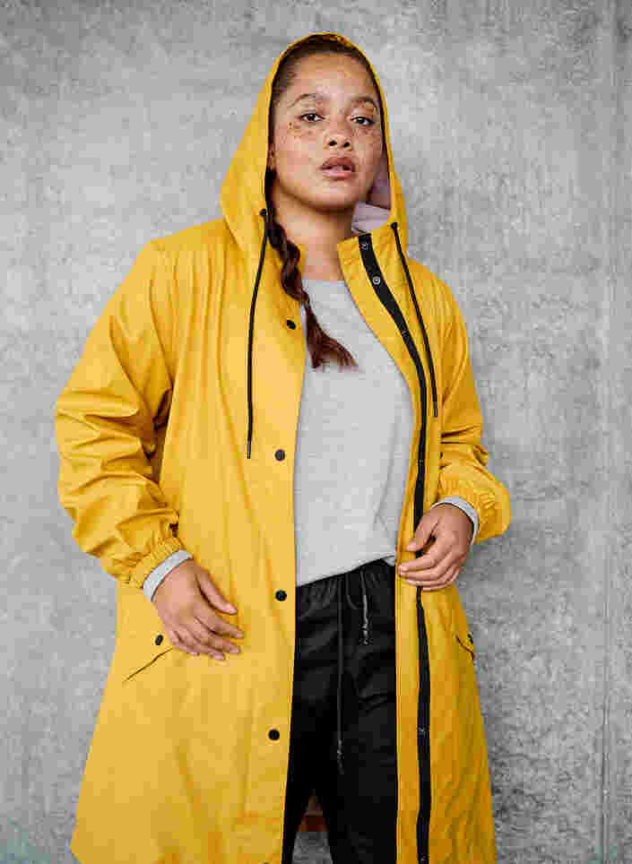 Rain jacket with hood and button fastening, Spruce Yellow, Image image number 0