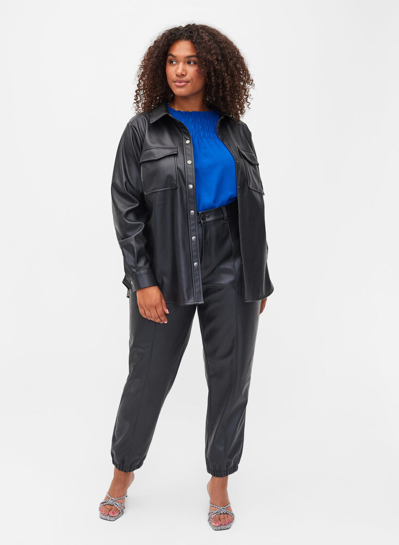 Trousers in faux leather, Black, Model image number 0