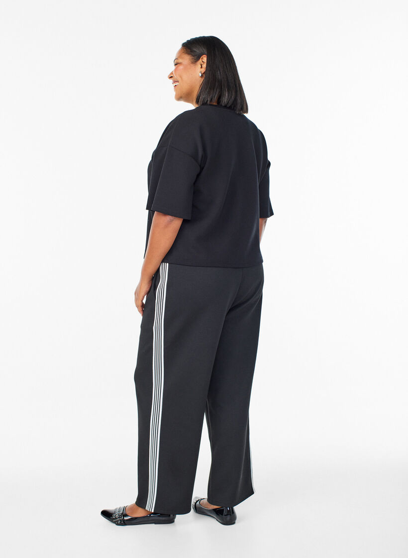 Trousers with side stripes, Black, Model image number 1