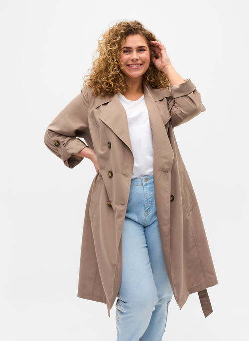 Plain-coloured trenchcoat with tie belt and pockets