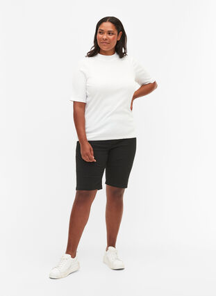 Close-fitting shorts with back pockets, Black, Model image number 3