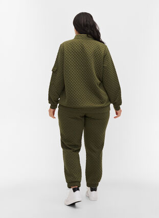 Sweatpants with quilted pattern, Ivy Green, Model image number 1