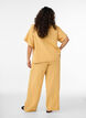 High-waisted cotton muslin trousers with loose legs, Yellow, Model image number 1