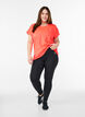 Solid-coloured training T-shirt, Coral, Model image number 1