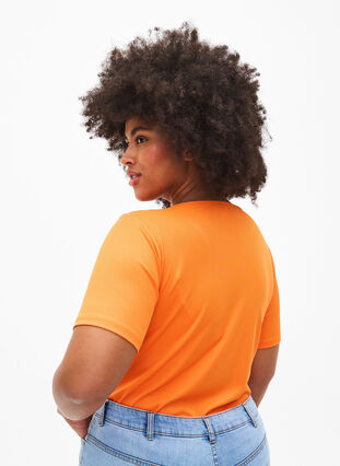 Tight-fitting V-neck blouse with mesh detail, Vibrant Orange, Model image number 1