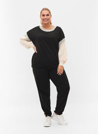 Knitted trousers with colorblock pattern, Black Comb, Model