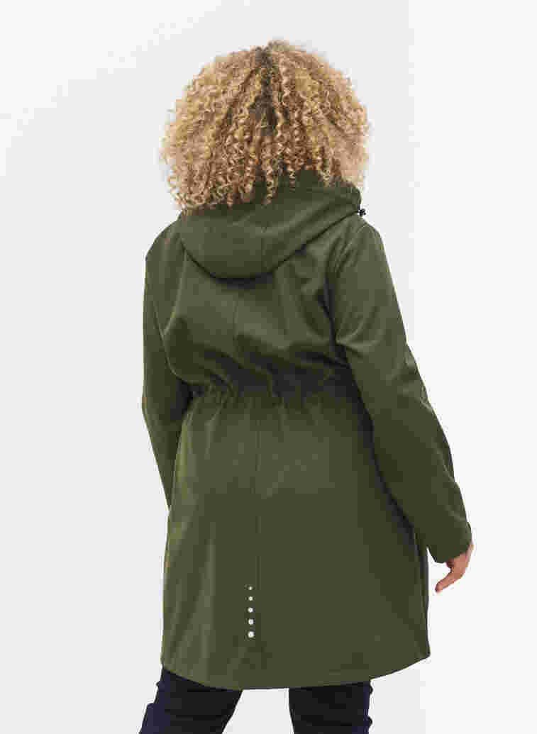 Long, hooded softshell jacket, Forest Night Solid, Model