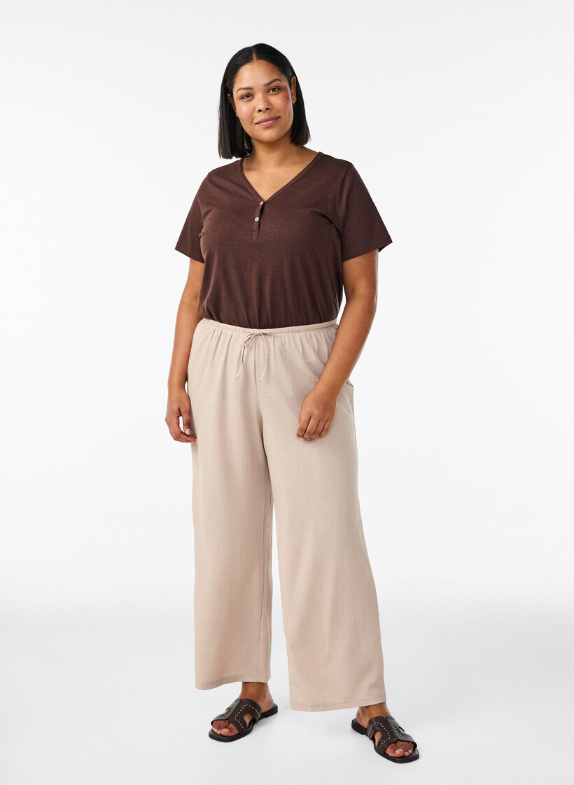 Wide-leg trousers in a light textured fabric, Beige, Model image number 0
