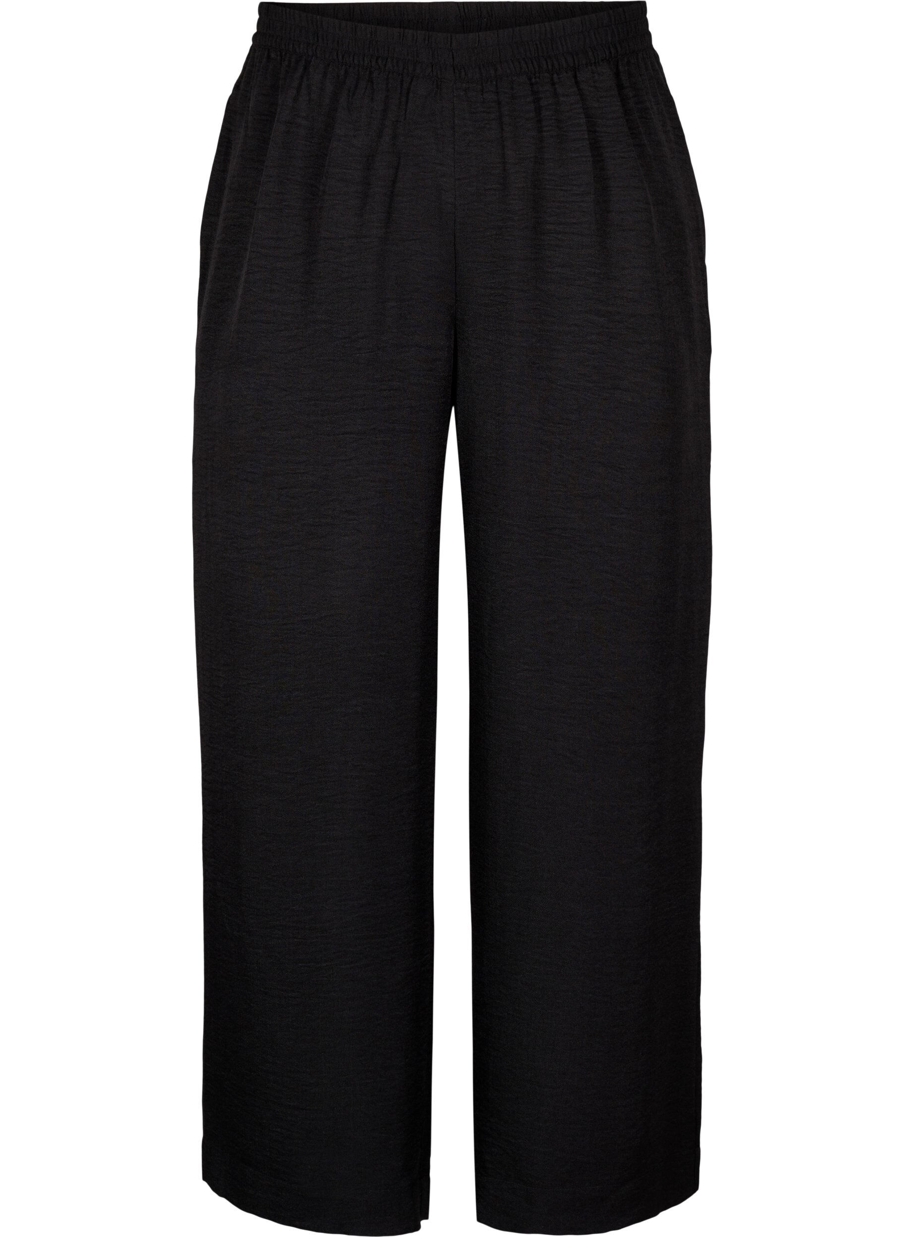 Loose trousers with elasticated waistband and pockets