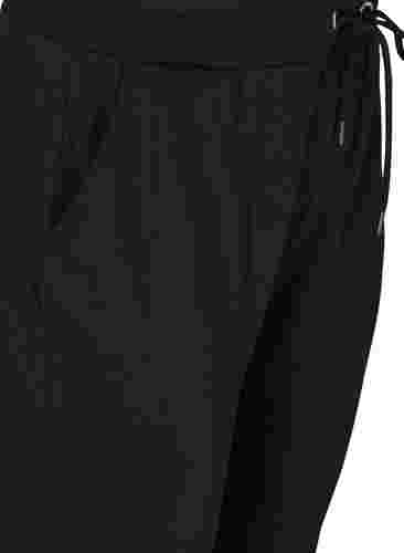 Loose workout trousers with pockets, Black, Packshot image number 2