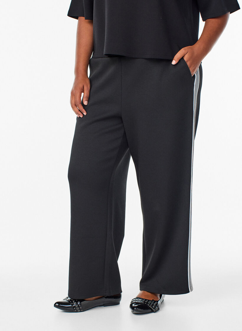 Trousers with side stripes, Black, Model image number 2