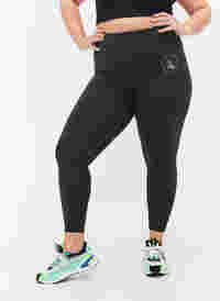 Solid-coloured gym leggings, Scarab, Model