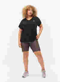 Printed training shorts, Black w. Text Print, Model