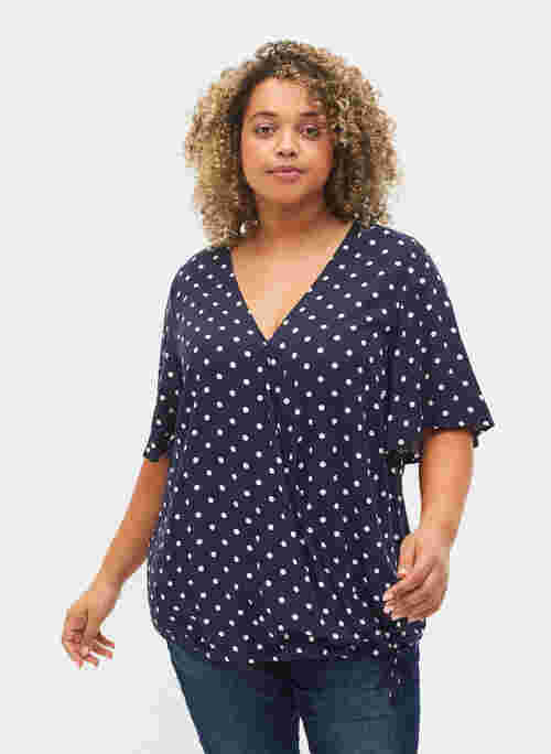 Short-sleeved polka dot wrap blouse