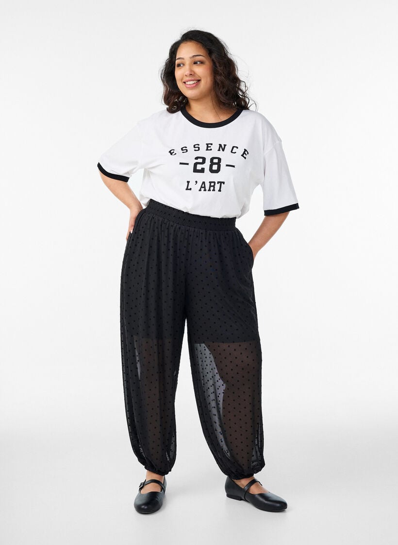 Mesh balloon trousers with polka dots, Black, Model image number 0