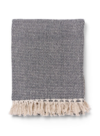 Patterned throw with fringes