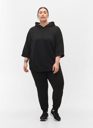 Loose joggers with pockets, Black, Model image number 0