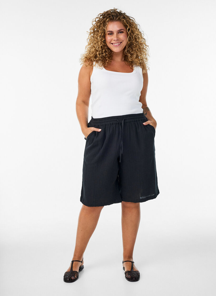 Loose cotton muslin shorts with a high waist, Black, Model image number 1
