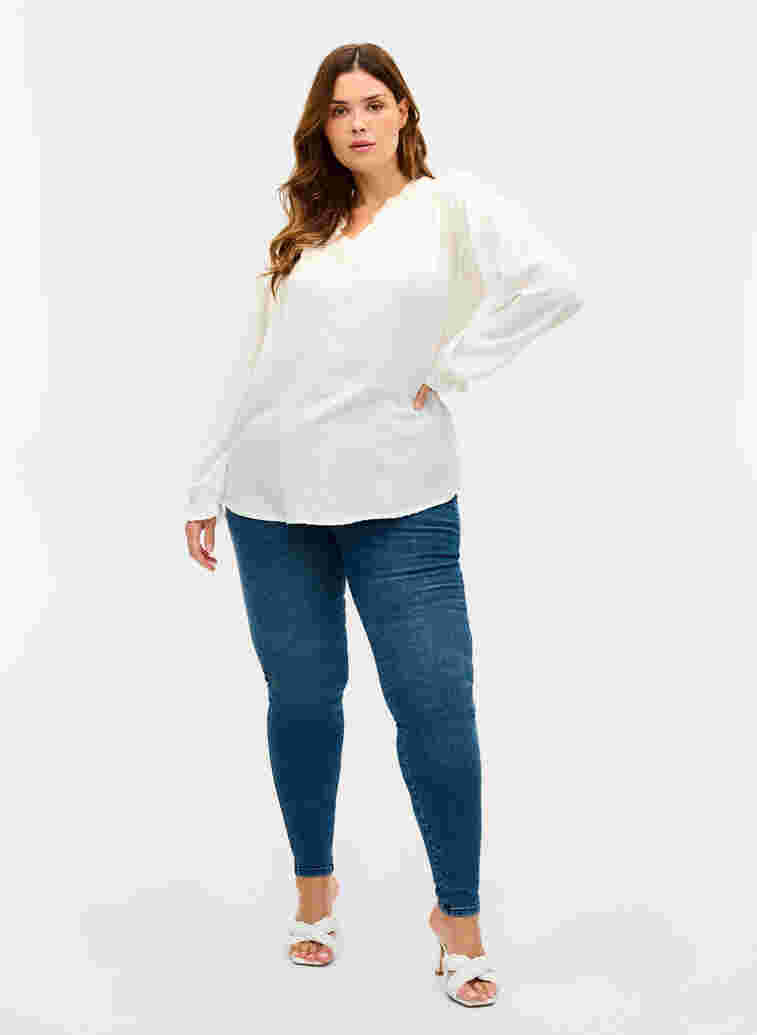 Long-sleeved blouse with smock and ruffle details, Bright White, Model image number 2