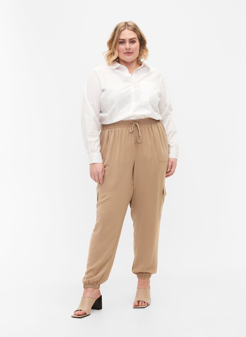 Solid coloured trousers with large pockets, Nomad, Model image number 0