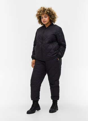 Quilted 2-in-1 jumpsuit with pockets, Black, Model image number 3