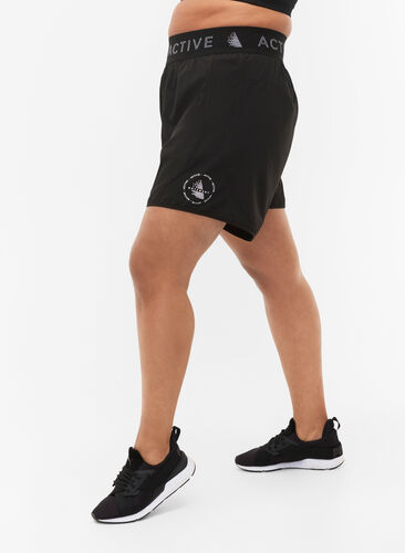 Workout shorts with back pocket, Black, Model image number 0