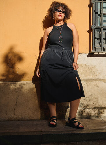 Midi skirt with slit and cargo pocket, Black, Image image number 0
