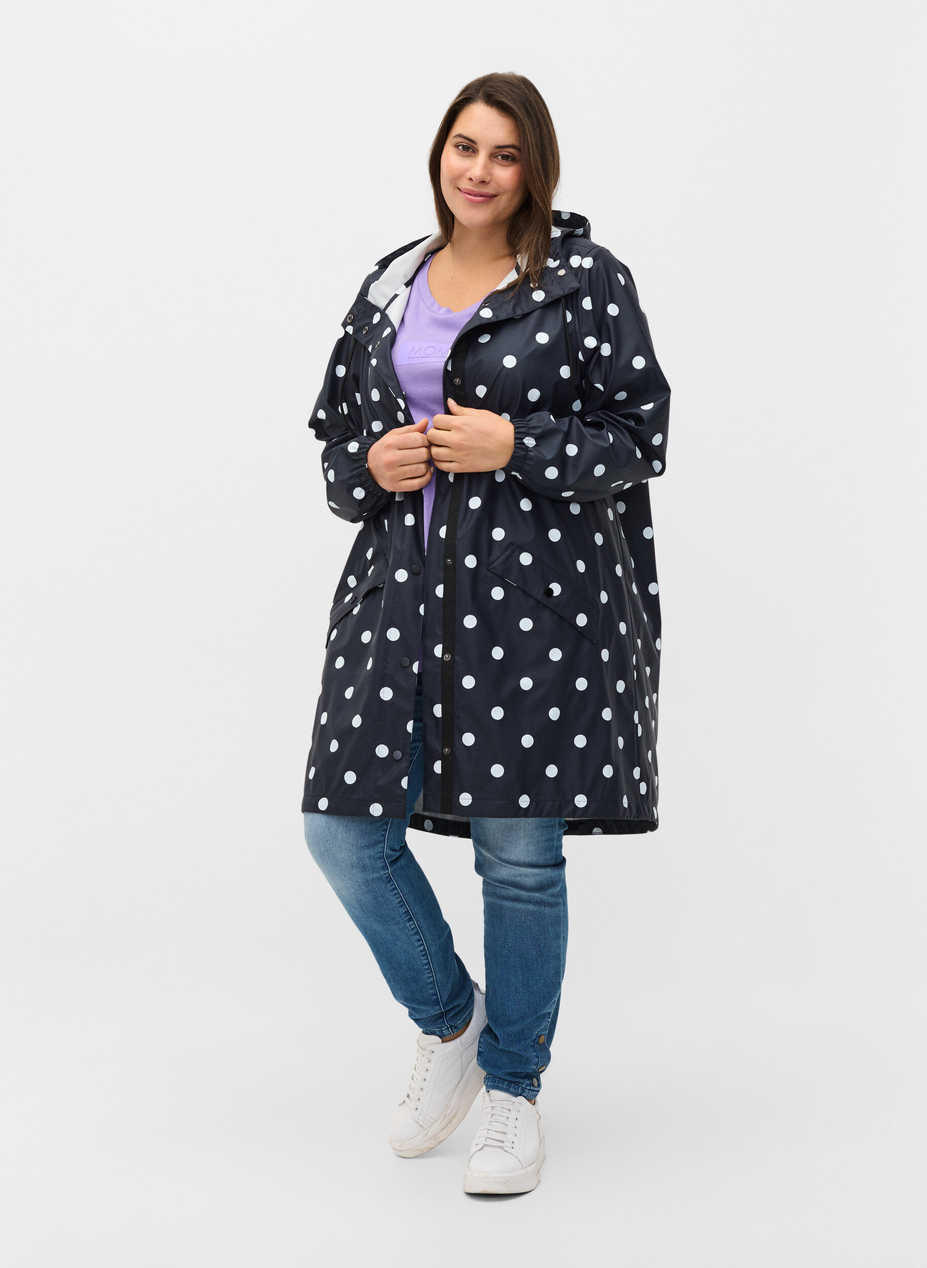 Patterned rain jacket with a hood 