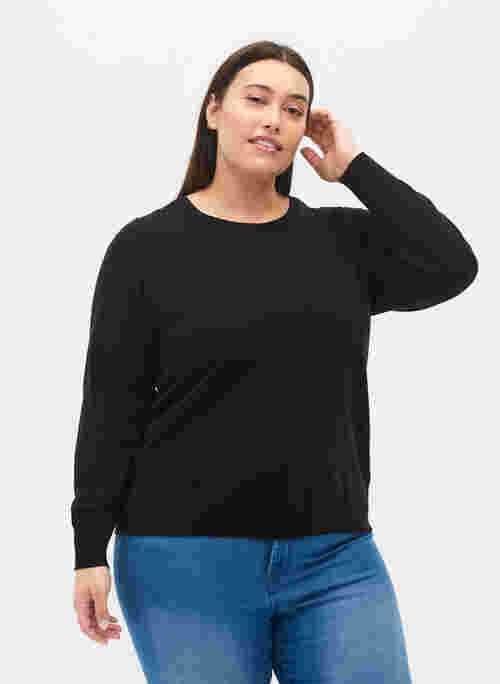 Plain coloured knitted jumper with rib details