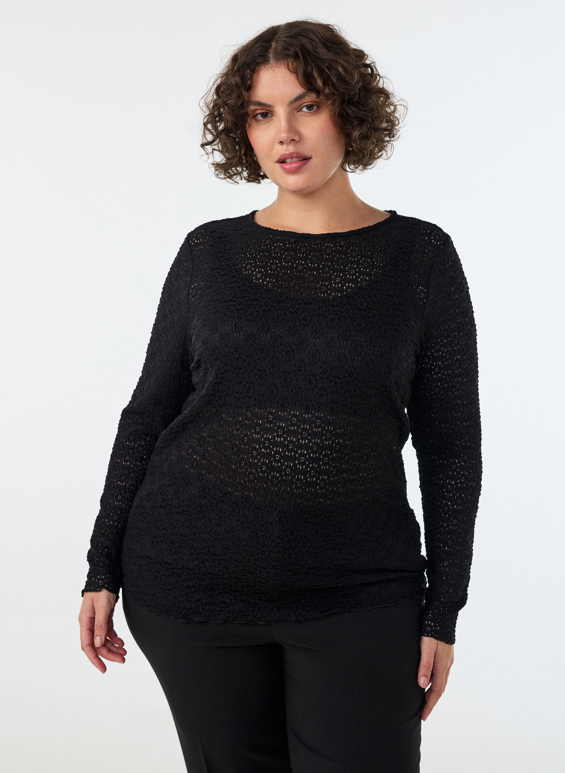Blouse with eyelet pattern and long sleeves, Black, Model