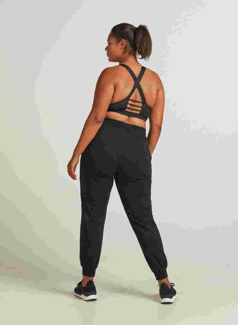 Loose fitness trousers with pockets, Black, Model image number 1